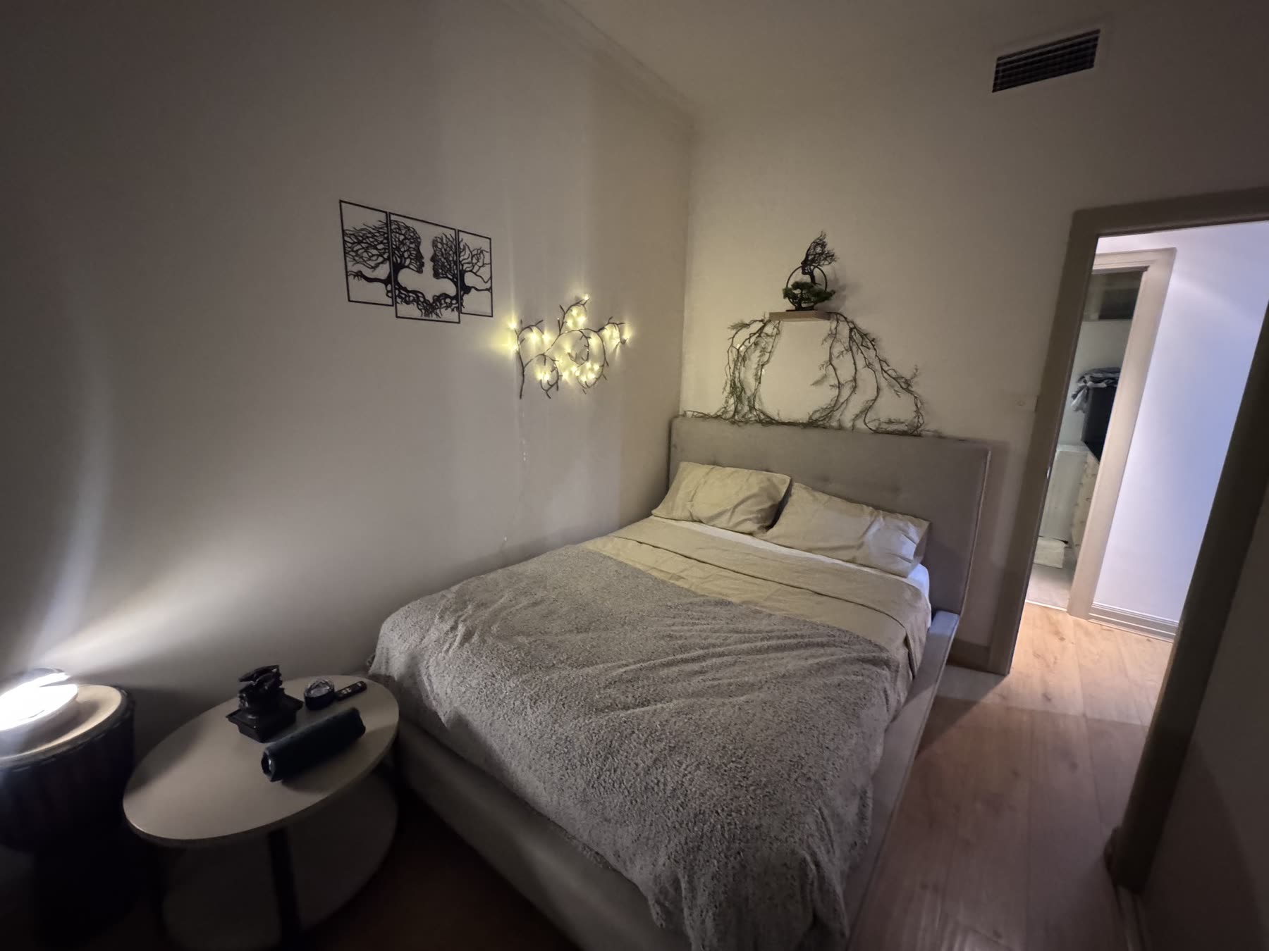 The quiet bedroom in lamplight